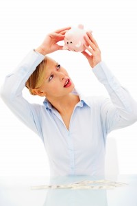 empty-piggy-bank-woman